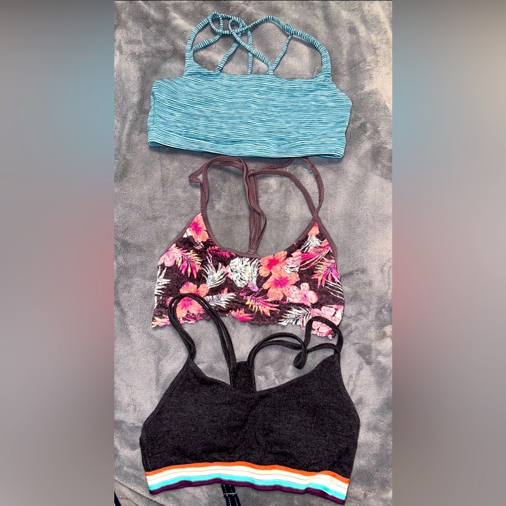 3 pairs of sports bras. Size XS. Pre loved